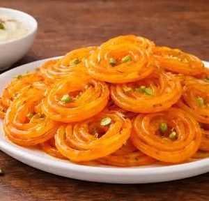 Jalebi Sweet Treat In White Plate