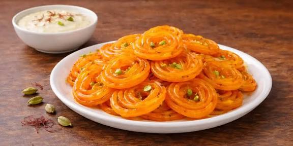 Jalebi Sweet Treat In White Plate